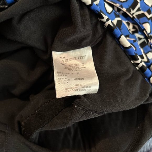 A shore fit Swim One Piece Swimsuit With Built In Shelf Bra And